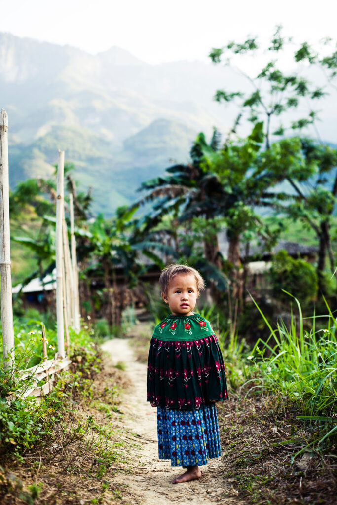 color portrait travel photograph of a little girl in the mountains of Ha Giang