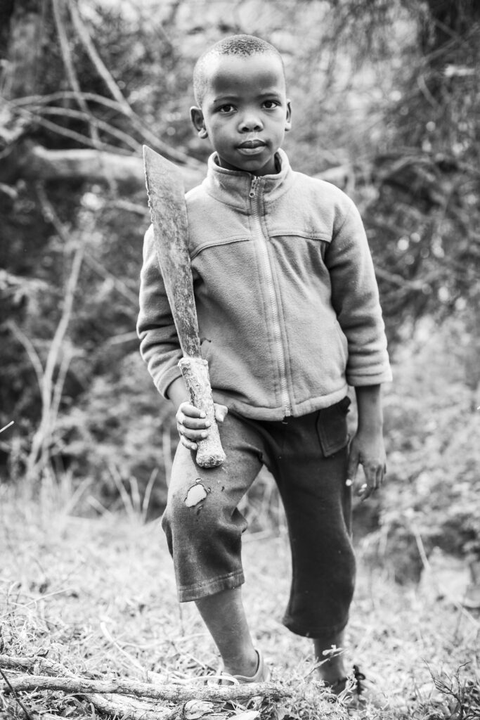 Black and white picture of a young African boy