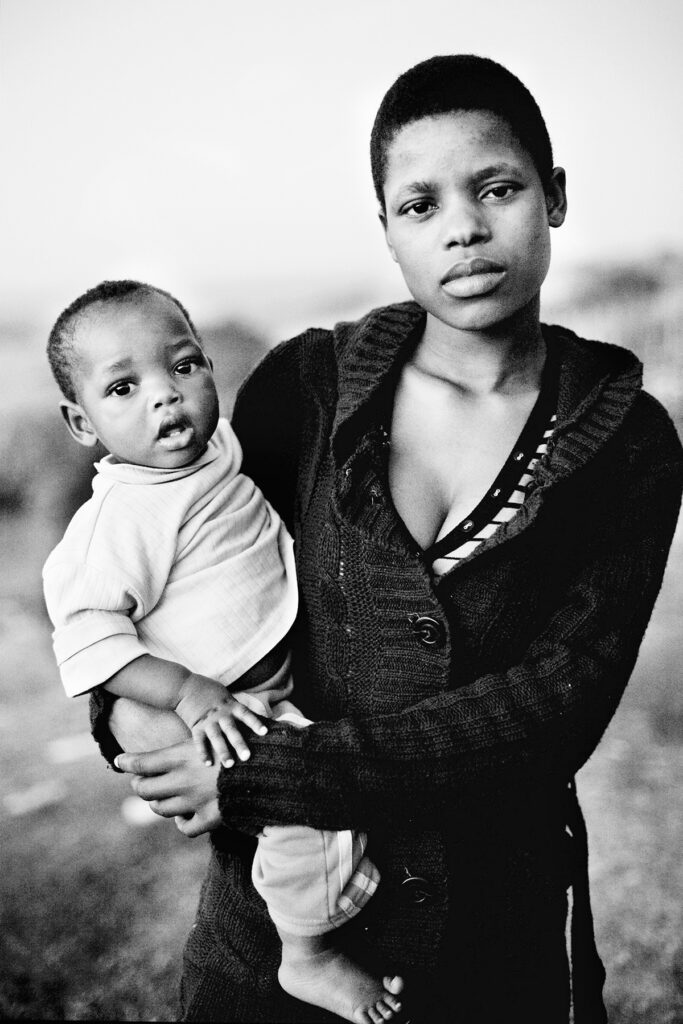 Black and white portrait of an African mother and baby, South Africa