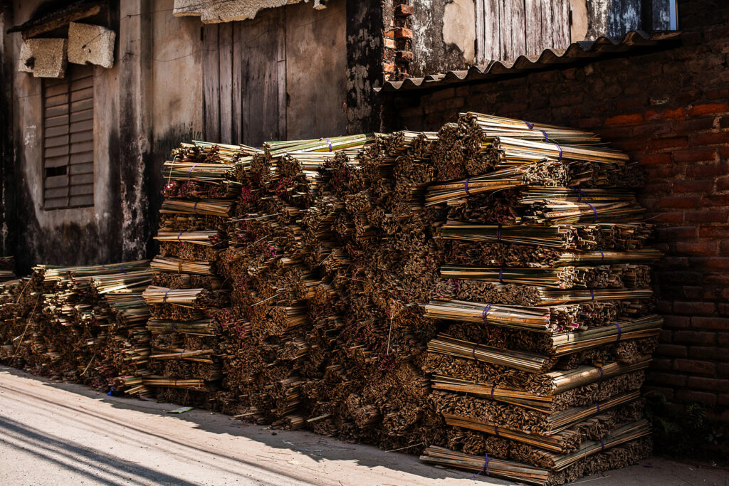 picture of cut bamboo stack prepared for incense stick making