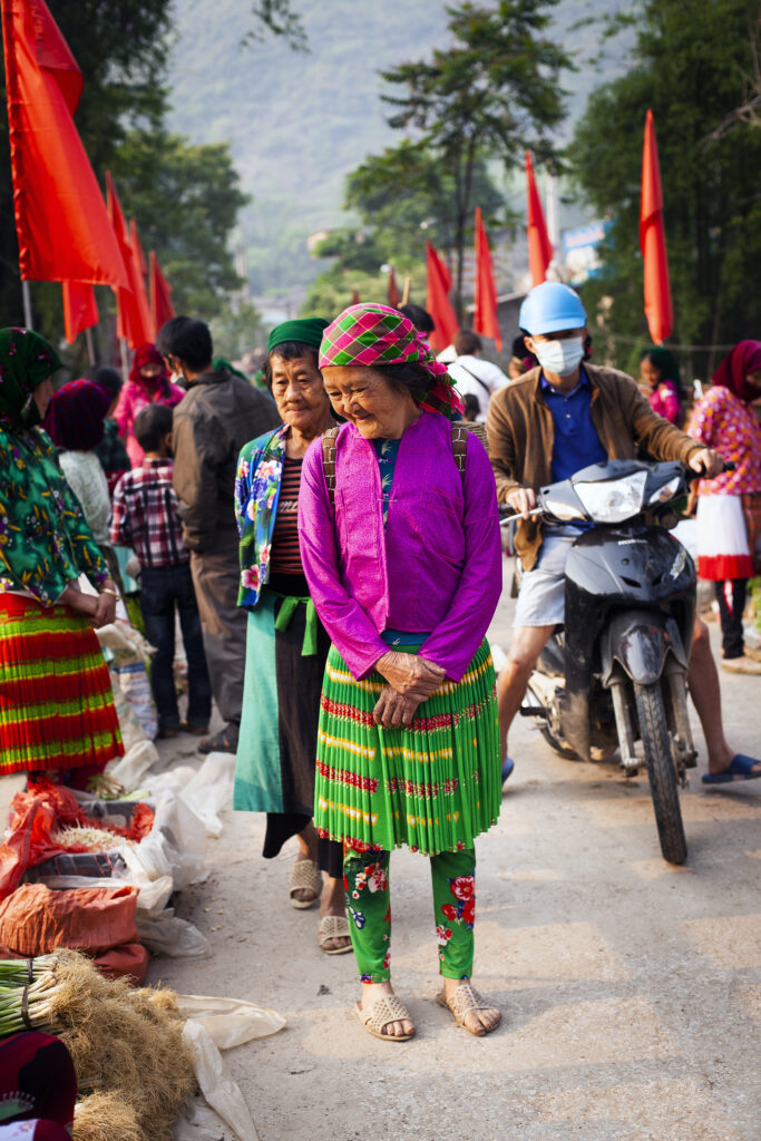 Colorful Ha Giang Hmong people at the cho lui, weekly market