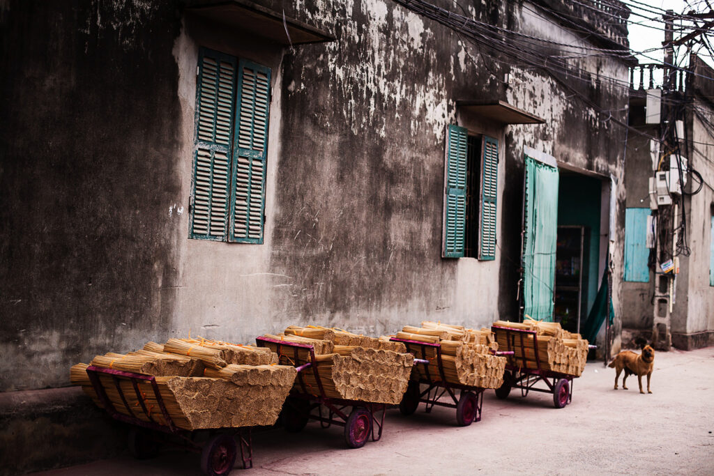 Photo of several loads of incense sticks waiting for the dye