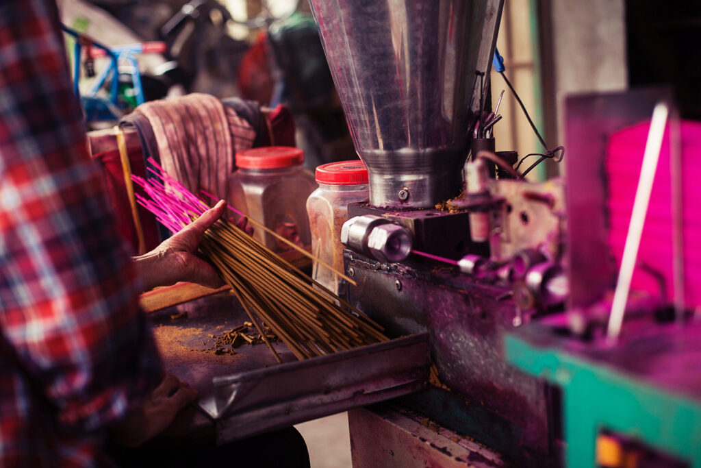 incense sticks in process of getting incense applied