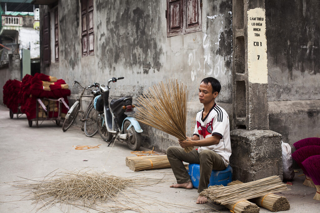 A picture of a villager sorting incense