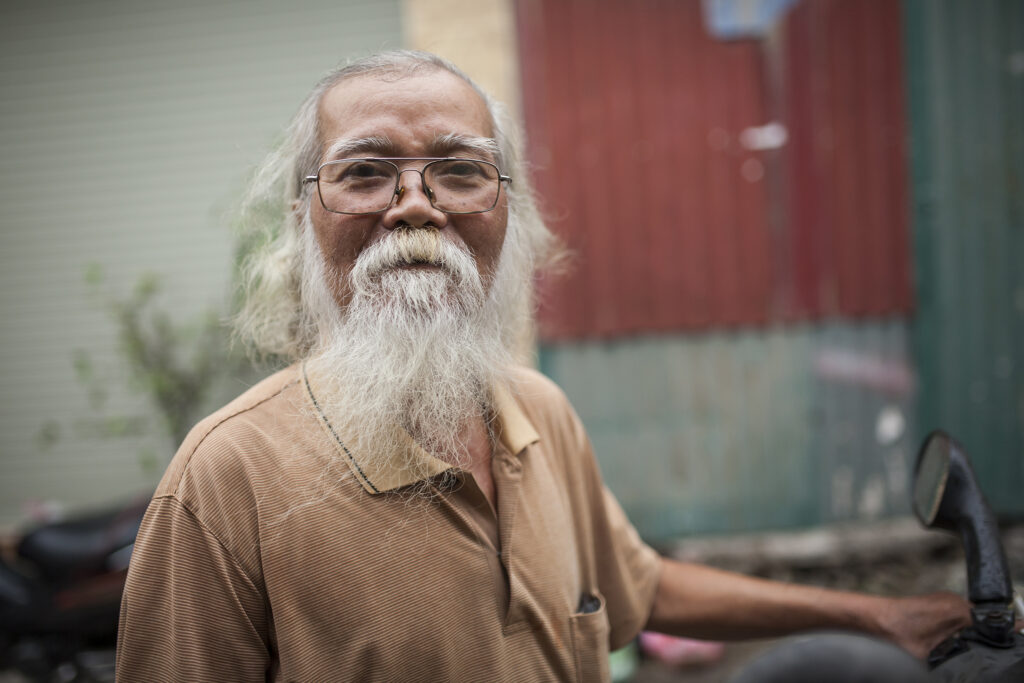 Portrait of a Vietnamese man with white beard travel photography art